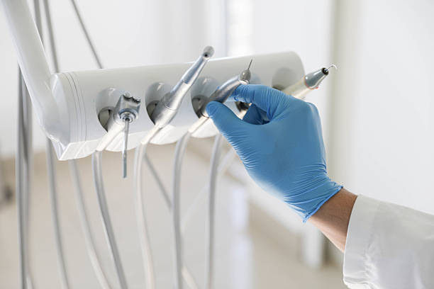 Professional Tooth Extraction technician working in Manhattan, NY